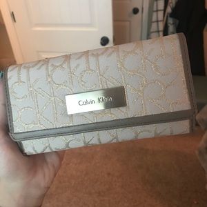 Calvin Klein logo wallet- tan and gold